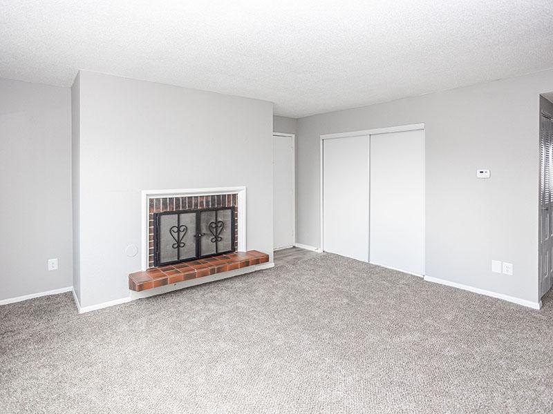 Carpeted Living Space | Riverside Heights Apartments in Riverside, MO