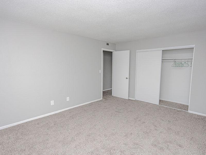 Bedroom with Carpet | Riverside Heights Apartments in Riverside, MO
