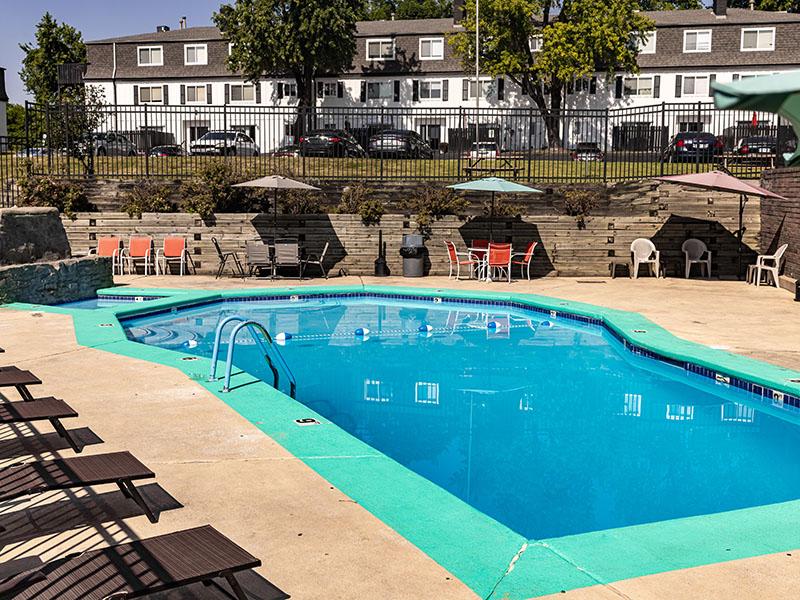 Seating Around Pool | Riverside Heights Apartments in Riverside, MO