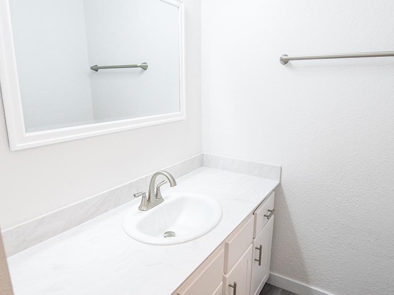 White Cabinets in Bathroom | The Rue Apartments in Salt Lake City