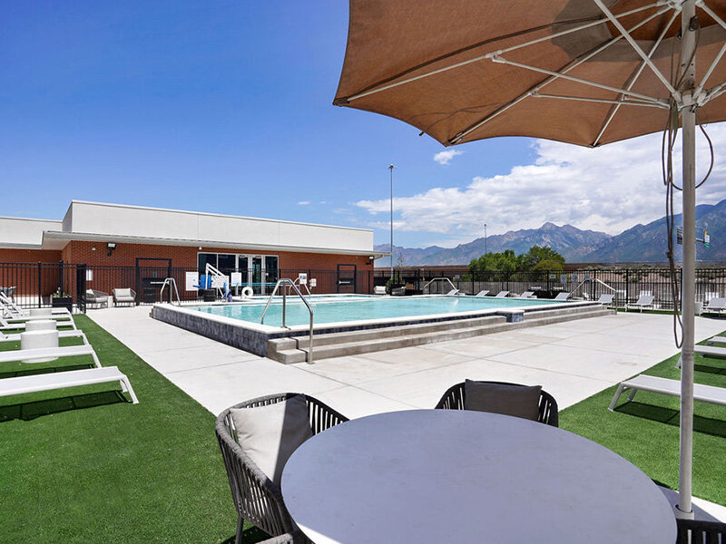 Pool and Shaded Seating | Skyline Peaks Apartments