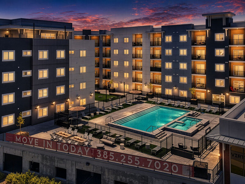 Twilight View of Pool | Skyline Peaks Apartments