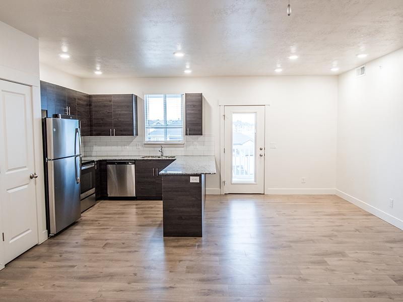 Kitchen and living Space | Trail Hollow Apartments in West Haven, UT