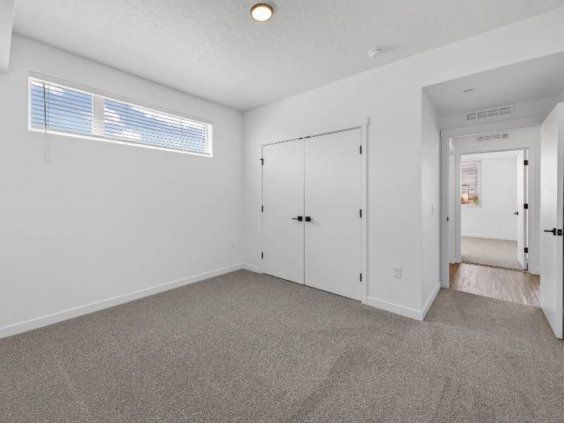 Bedroom with Clerestory Windows | Three Bedroom | Village Apartments