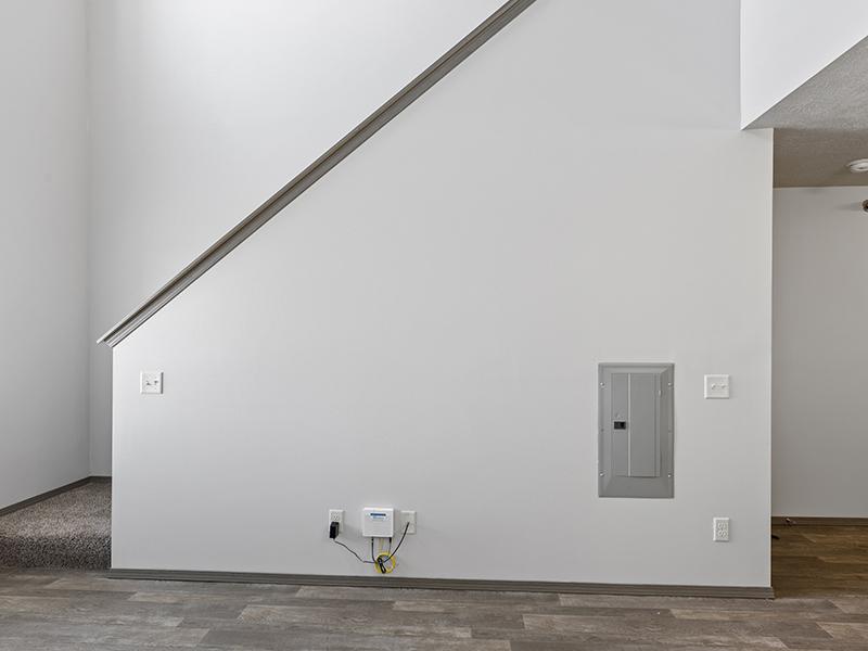 Wall by Stairs | Whisper Ridge Apartments in Sioux Falls, SD