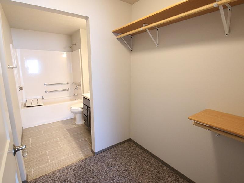 Closet and Bathroom | Whisper Ridge Apartments in Sioux Falls, SD