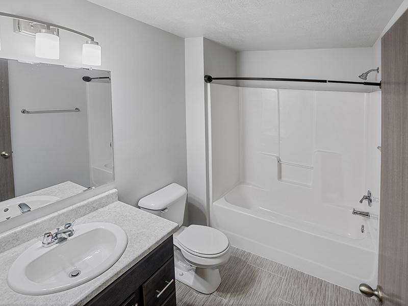 Bathroom with Tub | Whisper Ridge Apartments in Sioux Falls, SD