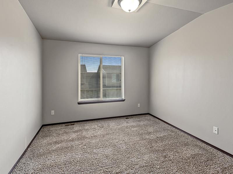 Carpeted Bedroom | West Pointe Commons Townhomes in Sioux Falls, SD